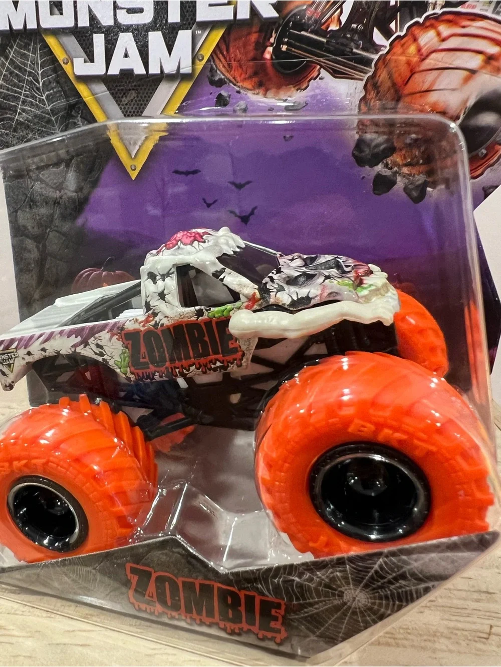 🔥Spin Master MONSTER JAM ZOMBIE Spooky Collection Monster Truck - Orange & White